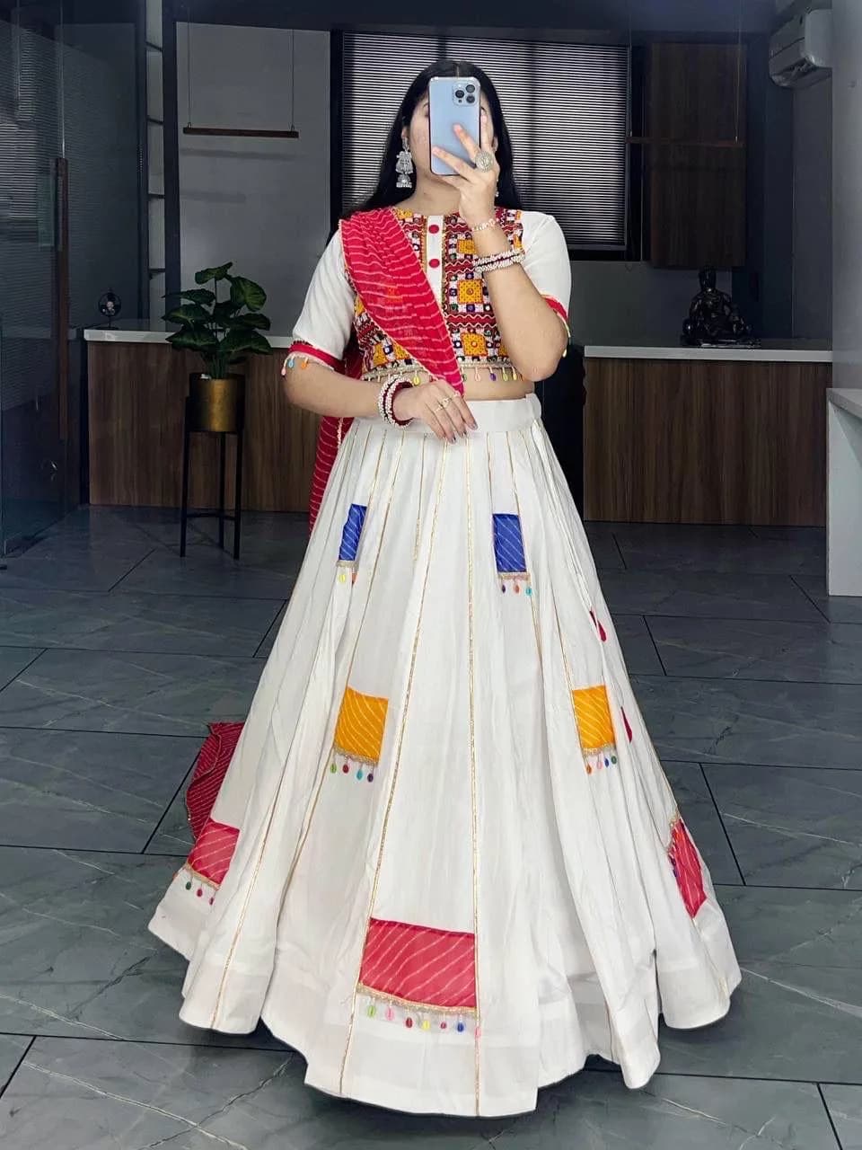 White Patchwork Pleated Lehenga with embroidered Blouse